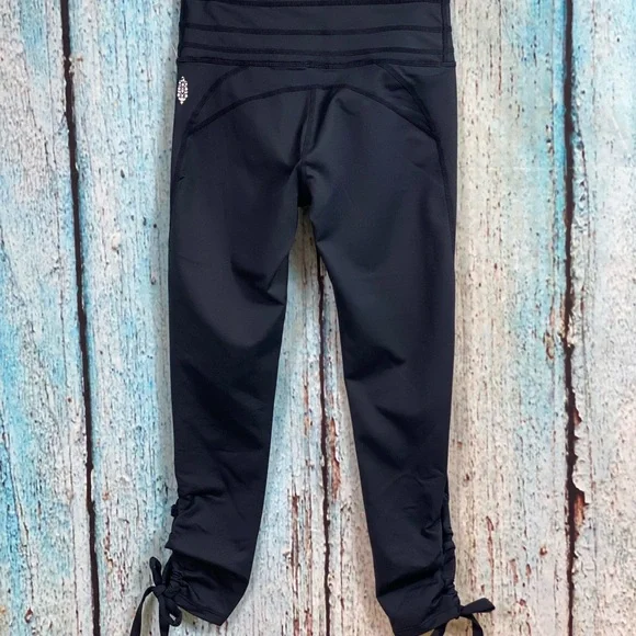 FREE PEOPLE NWOT Black Swerve Tie Ankle Leggings - Picture 13 of 16